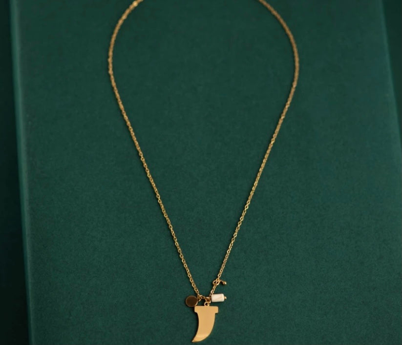 Gold Saber Tooth Necklace