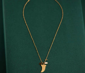 Gold Saber Tooth Necklace